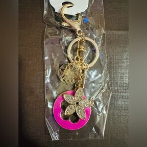 Colorful Gold Keychain with Floral and Clover Charm Design